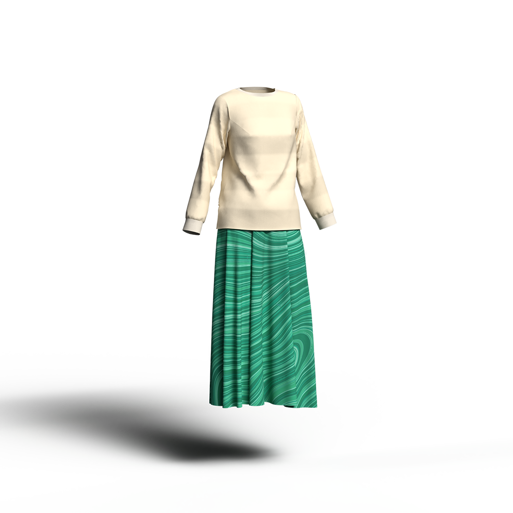 やわらかいベージュのカットソーにグリーンのマーブルスカートを合わせたコーディネート。ナチュラルなカラーイメージ。